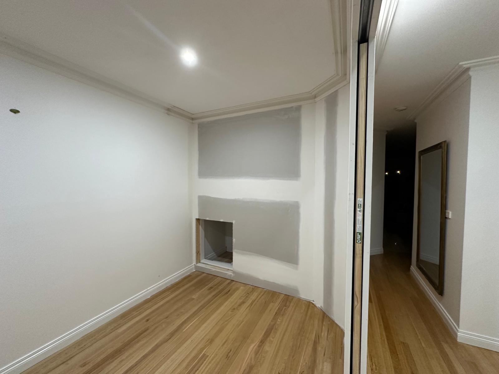 Living room cornice restoration with feature wall work